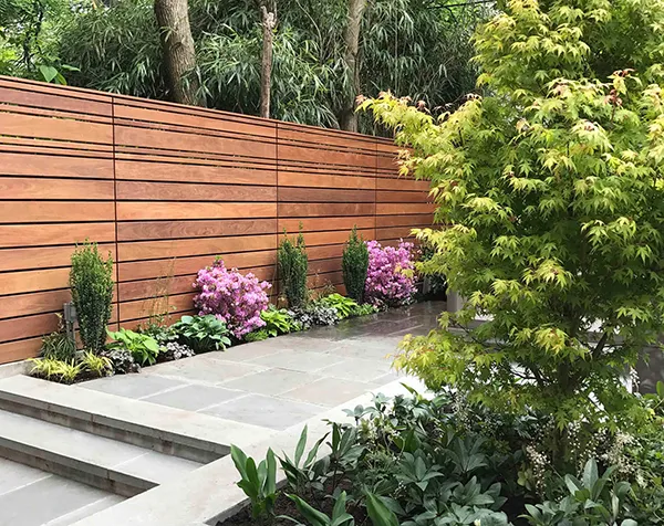 Lựa chọn đá tường rào vân gỗ góp phần tô đậm giá trị thẩm mỹ cho không gian nhà bạn
