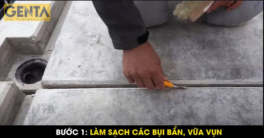 Quá trình làm sạch bề mặt khe lún bê tông trước khi thi công, bước quan trọng trong xử lý chống thấm khe lún