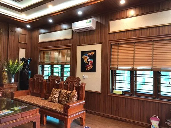 Thiết kế phòng khách hiện đại cùng vách ốp PVC giả đá tinh xảo
