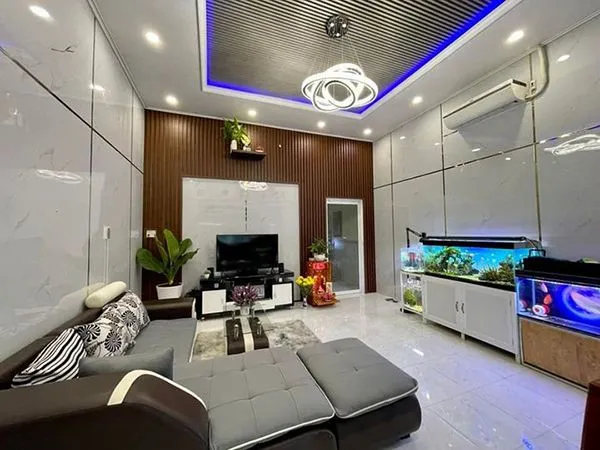 Thiết kế phòng khách hiện đại với tấm ốp nhựa PVC vân sóng