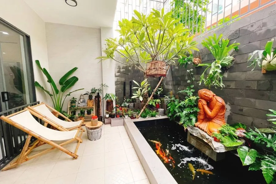 Tiểu cảnh hồ cá kích thước nhỏ với tượng Phật ngủ an tĩnh