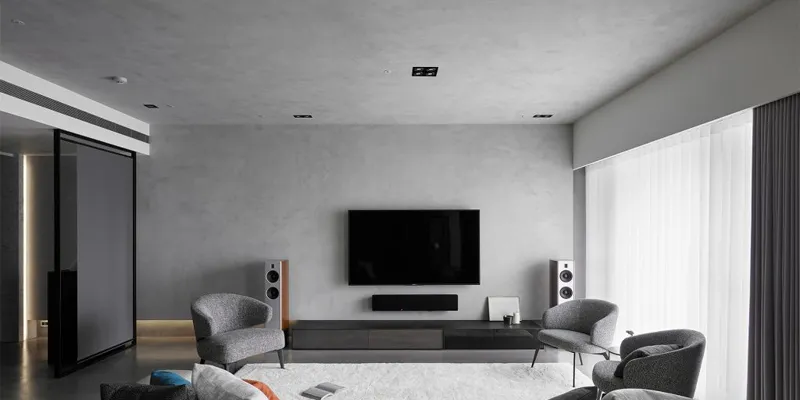 Ứng dụng tấm nhựa ốp tường giả xi măng cho phòng khách