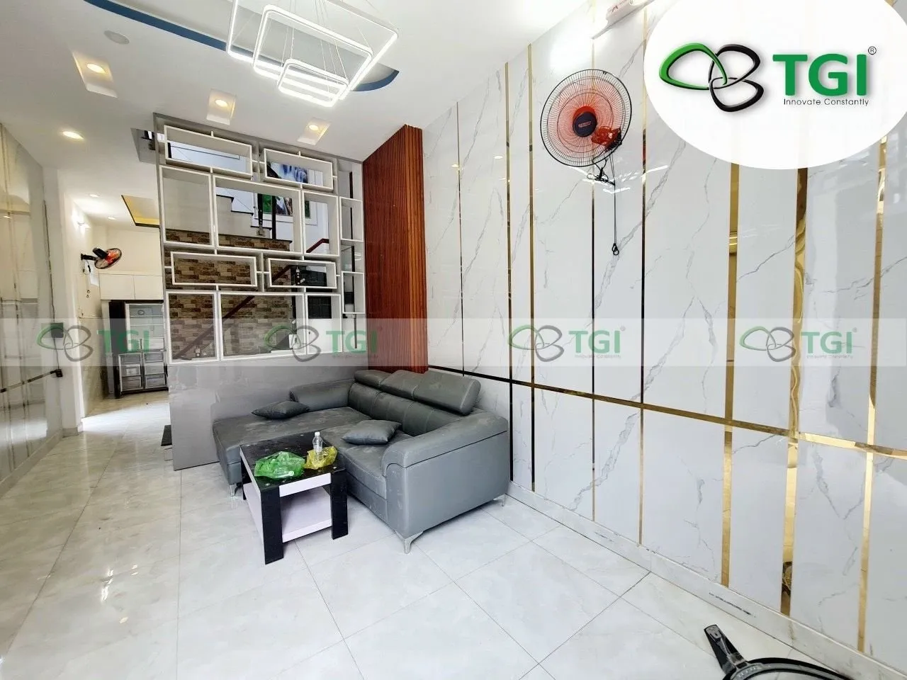 Ứng dụng thực tế tấm pvc vân đá phòng khách