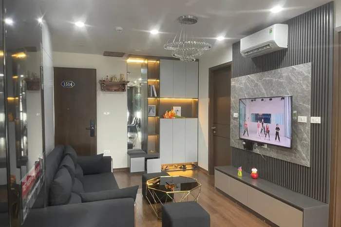 Vách tivi nhựa giả đá lam sóng phòng khách với vân đá xám sang trọng