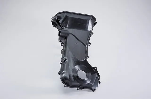 Vỏ xích động cơ ô tô, một ứng dụng điển hình của nhựa nylon trong ngành công nghiệp ô tô.